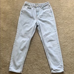 Light wash cropped Topshop mom jeans.